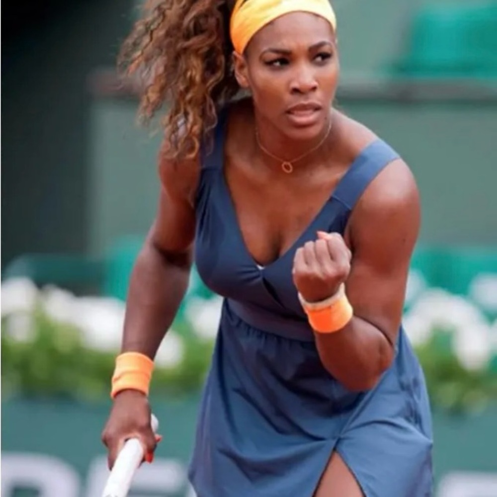 Nike serena Williams tennis dress. Blue with an orange swoosh